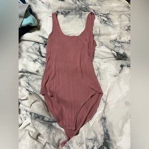 Pink bodysuit